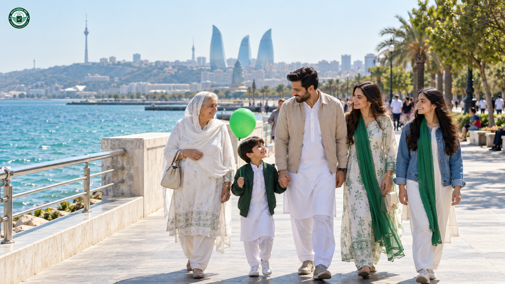 Pakistani family walking on Baku Boulevard by the Caspian Sea with the Flame Towers behind them