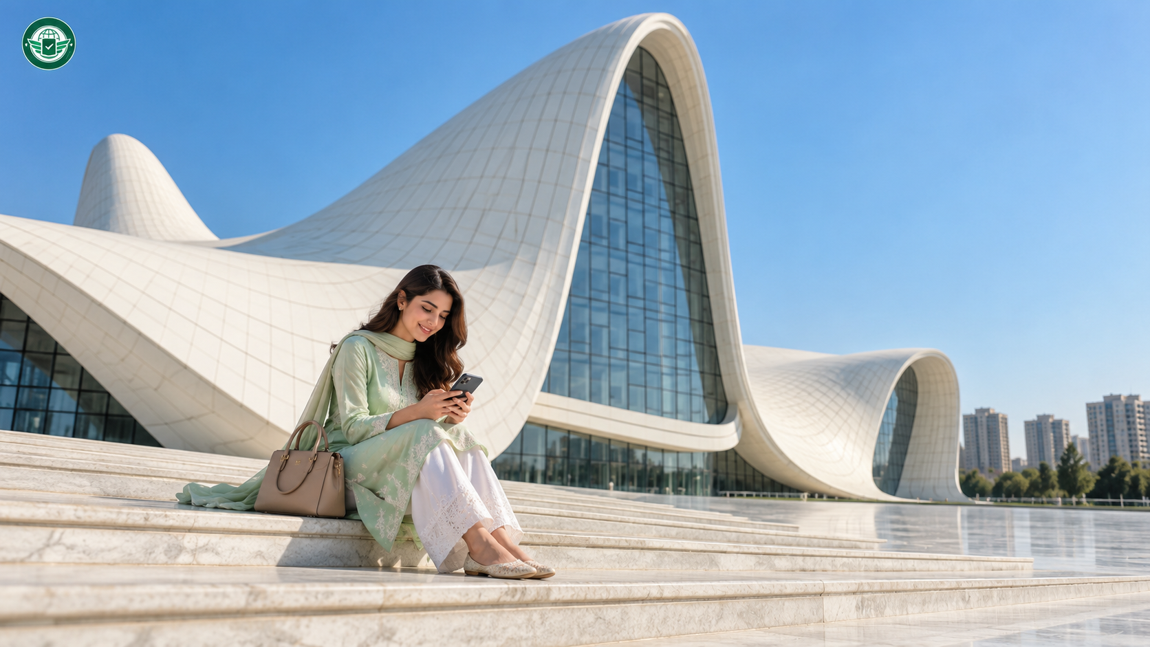 Pakistani woman checking her Azerbaijan e-visa status on her phone on the steps of the Heydar Aliyev Center in Baku