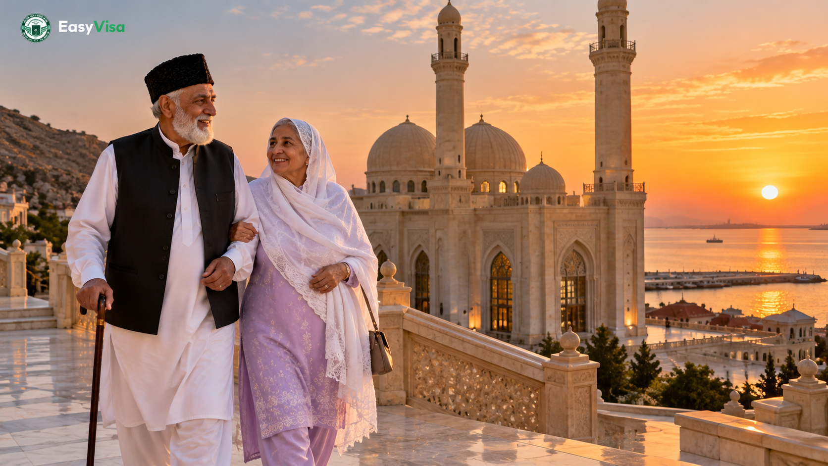 Elderly Pakistani couple walking at the Bibi-Heybat Mosque on the Caspian shore near Baku at sunset