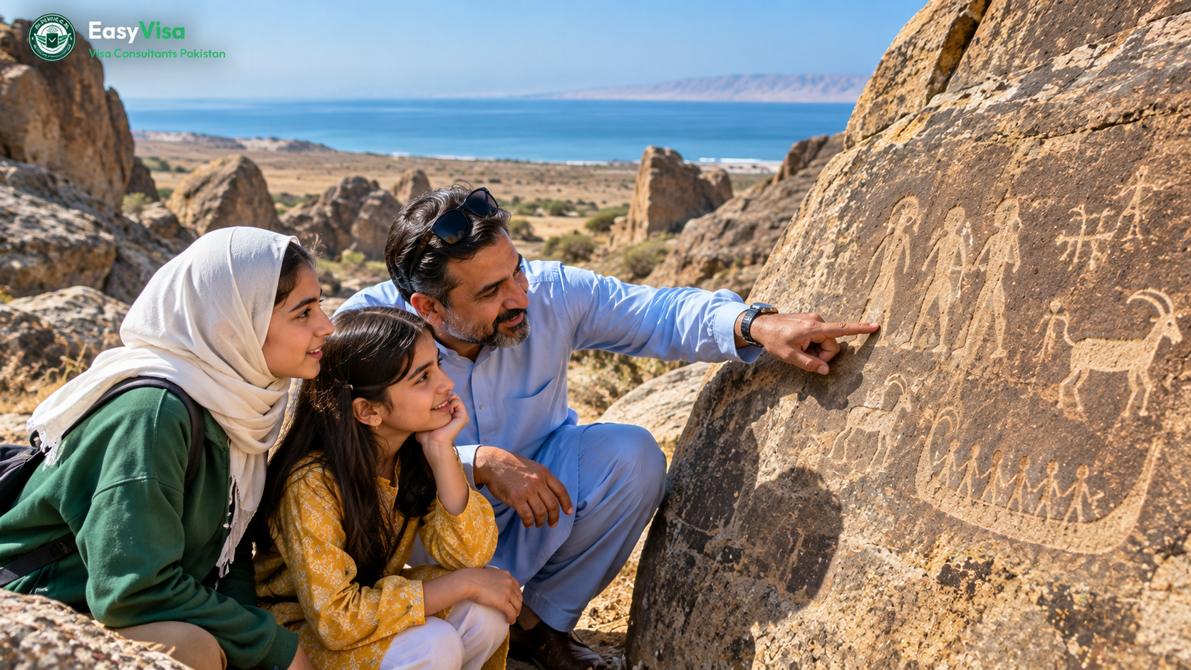 Pakistani father and two daughters looking at ancient rock engravings at Gobustan near Baku