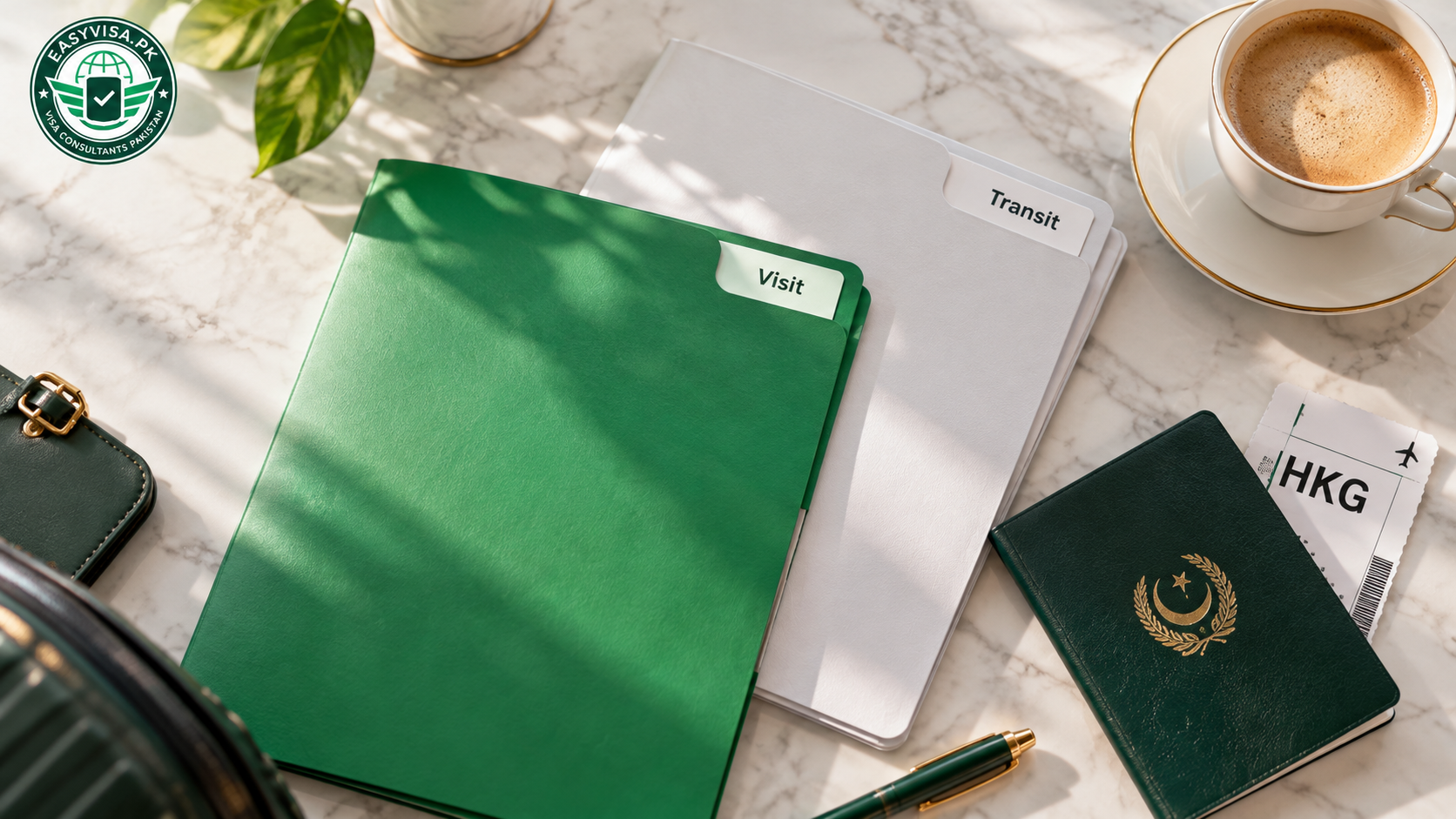 Visit and Transit visa folders beside a Pakistani passport and Hong Kong boarding pass