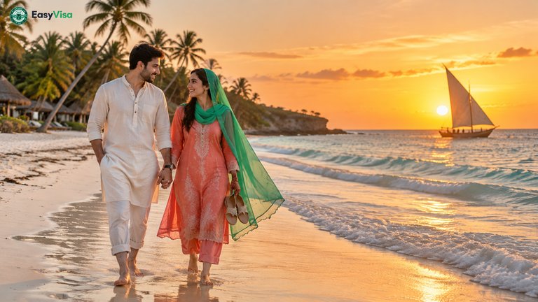 Pakistani honeymoon couple walking barefoot on Diani Beach, Kenya, at sunset with a traditional dhow sailing offshore