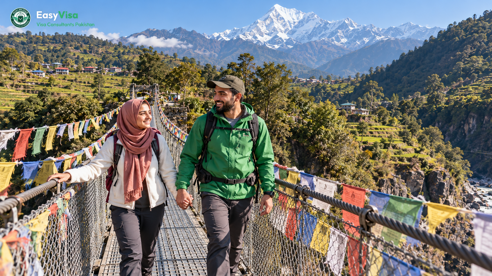 Pakistani honeymoon couple crossing a suspension bridge with prayer flags in the Annapurna foothills near Pokhara