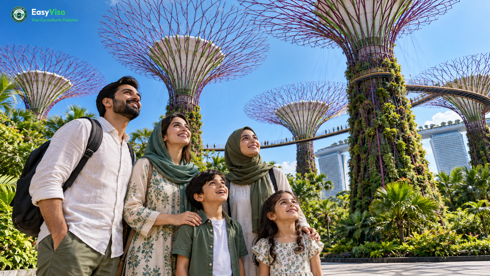 Pakistani family with children among the Supertree Grove at Gardens by the Bay in Singapore