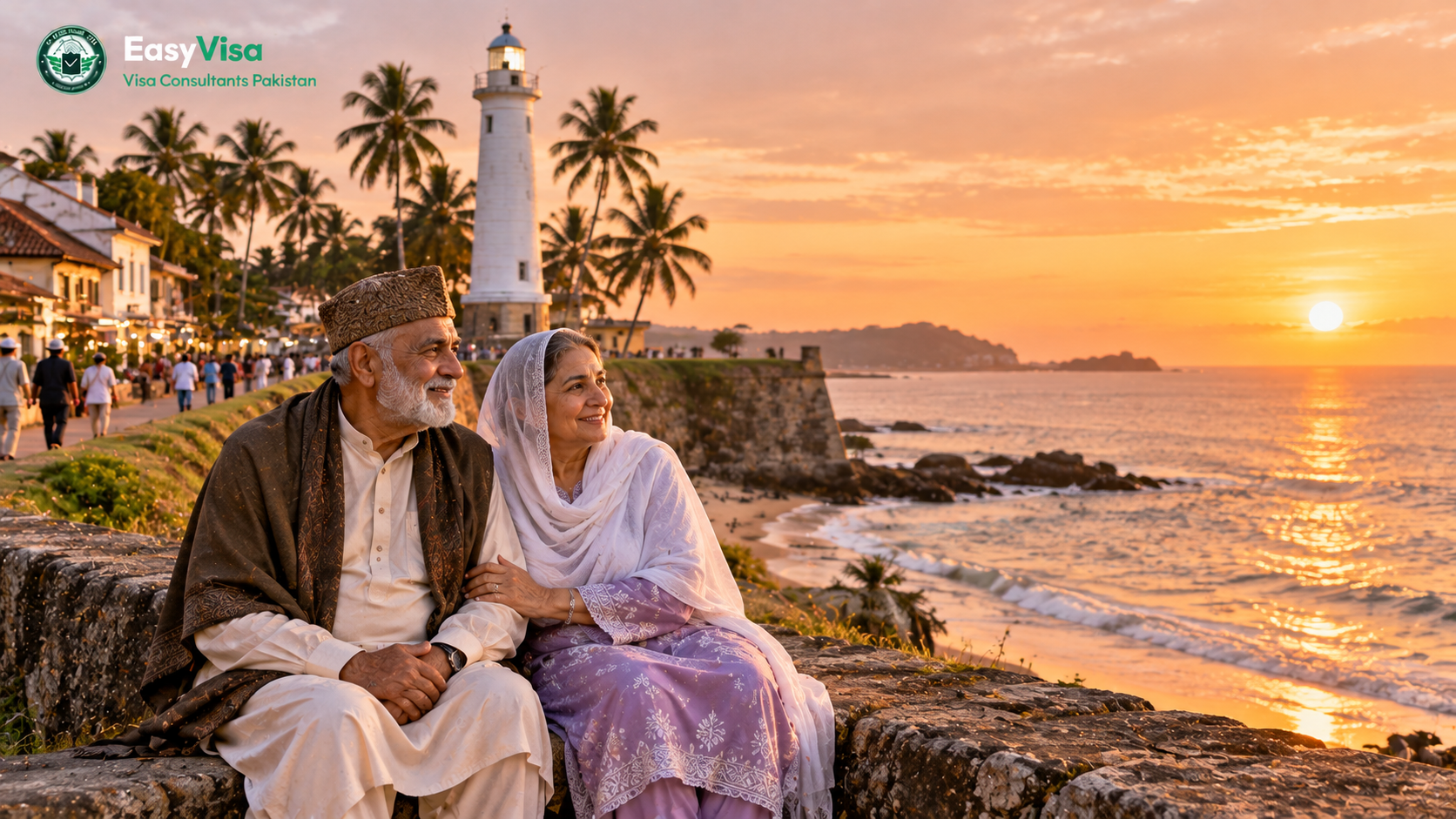 Elderly Pakistani couple sitting together on the Galle Fort ramparts near the white lighthouse at golden hour