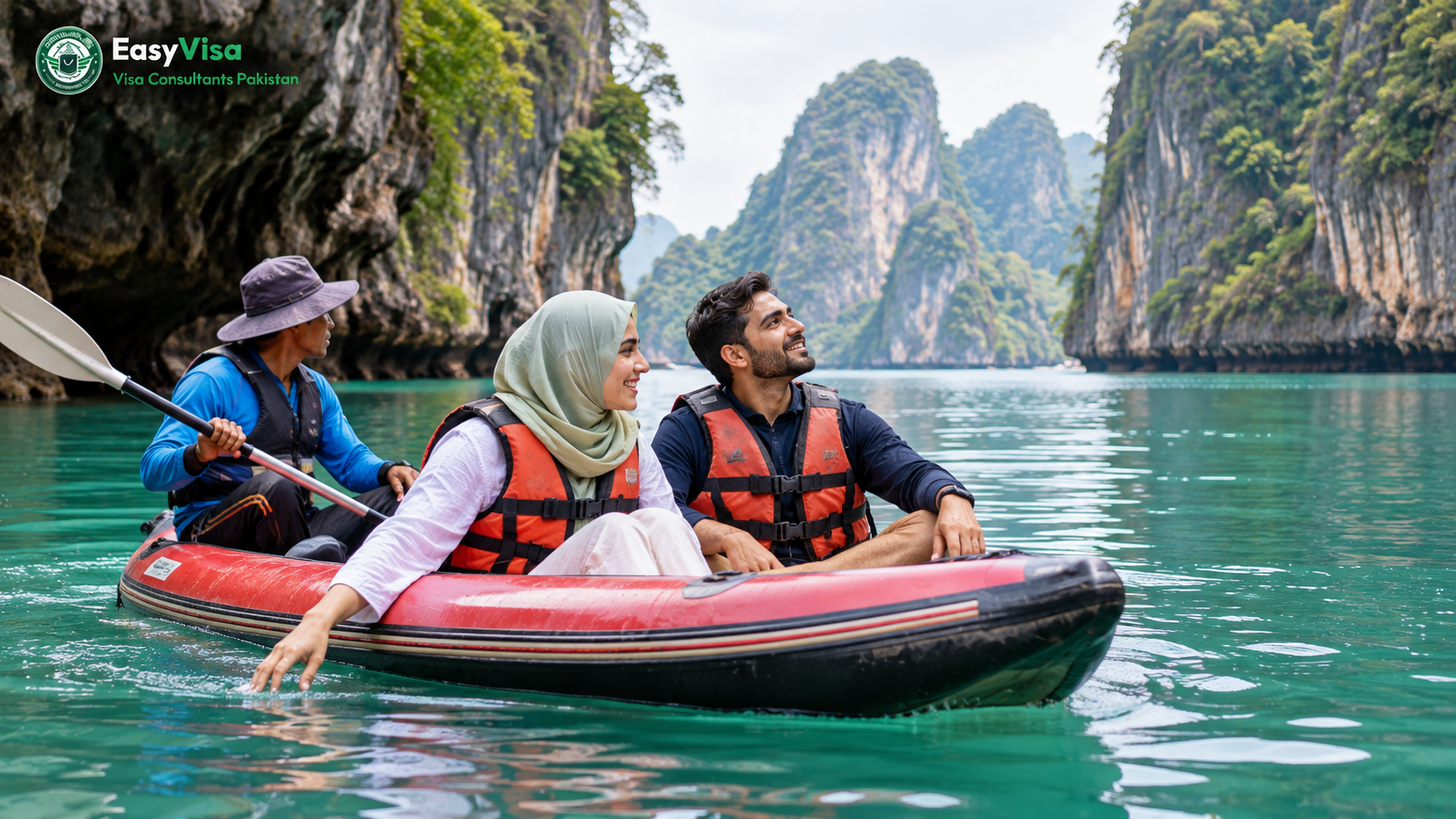 Pakistani honeymoon couple in a sea canoe among limestone cliffs in Phang Nga Bay near Phuket